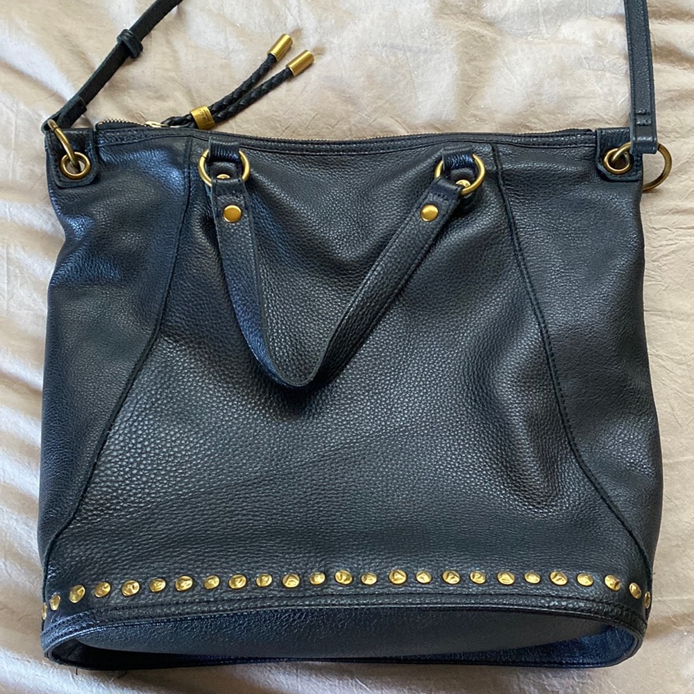 The Sak Black Leather Shoulder Bag with Gold Stud Accents
